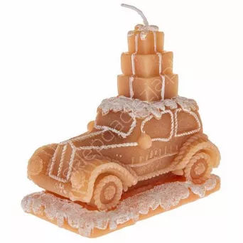 Świeca - samochód z prezentami